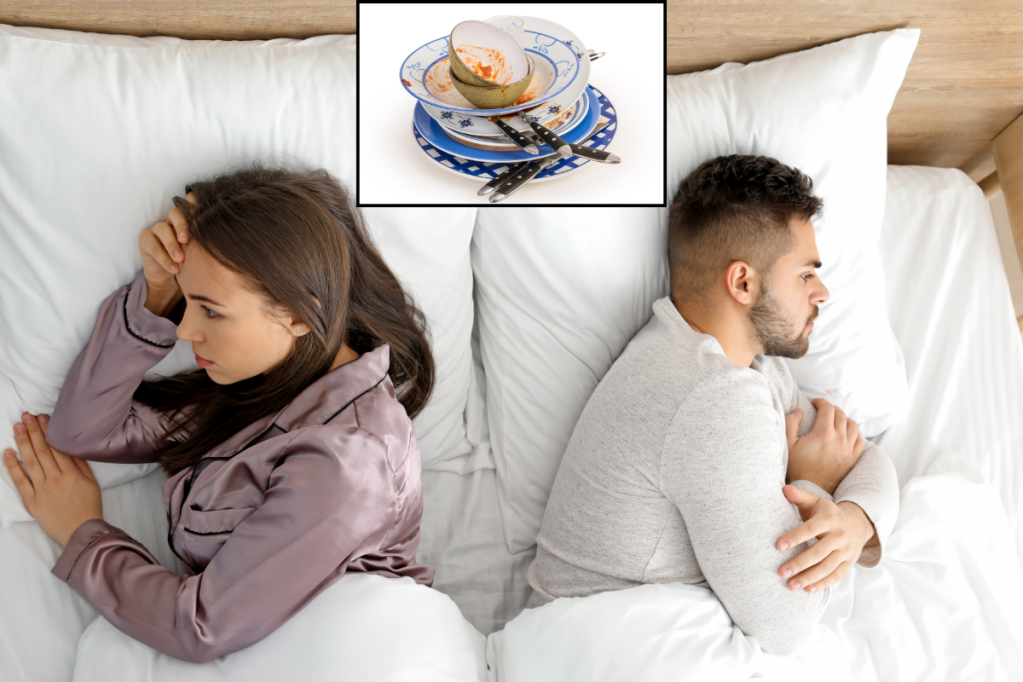 Tired young woman lying in bed looking worried and stressed while her partner turns away, symbolising unequal mental load in relationships